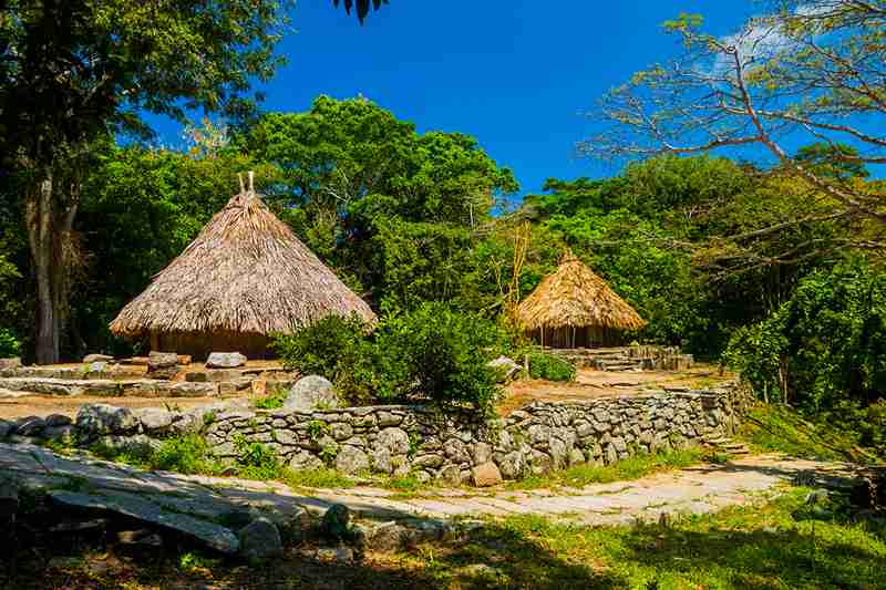Kogi man transporting goods up the mountain