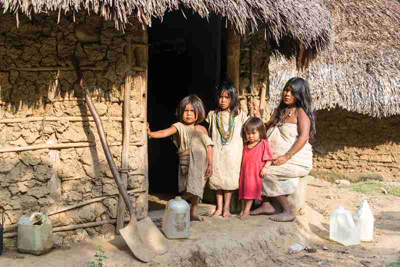 Wiwa family in front of their house